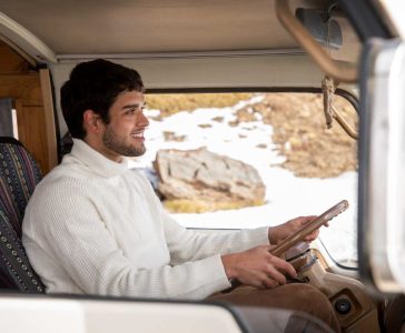 medium-shot-man-driving-campervan (1)